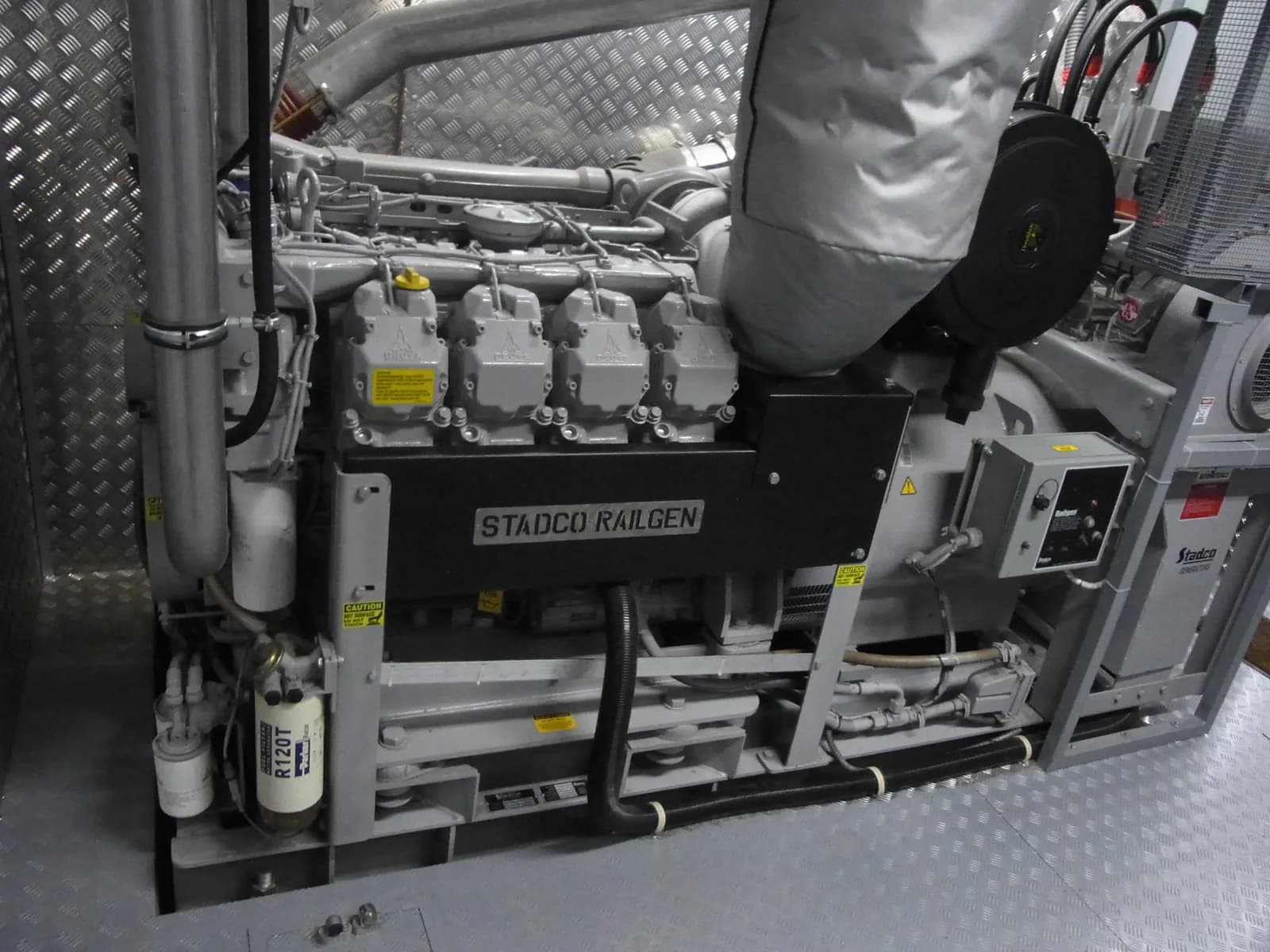 Deutz V-engine coupled to an alternator in an enclosed generator room