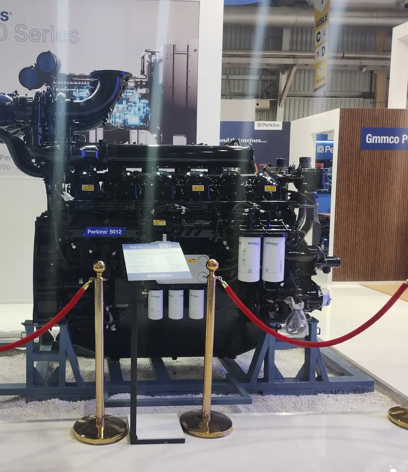 Large Perkins industrial diesel engine on a display stand